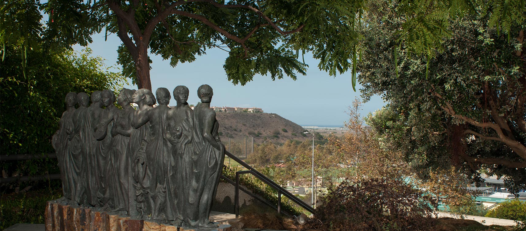 A garden with statues of nine muses